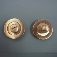 Satin brass bathroom turn and release