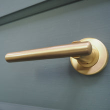 Load image into Gallery viewer, Challenger lever on rose handles satin brass