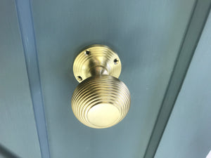 Satin brass reeded mortice knobs