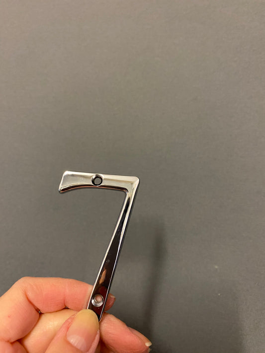 Polished chrome “7”