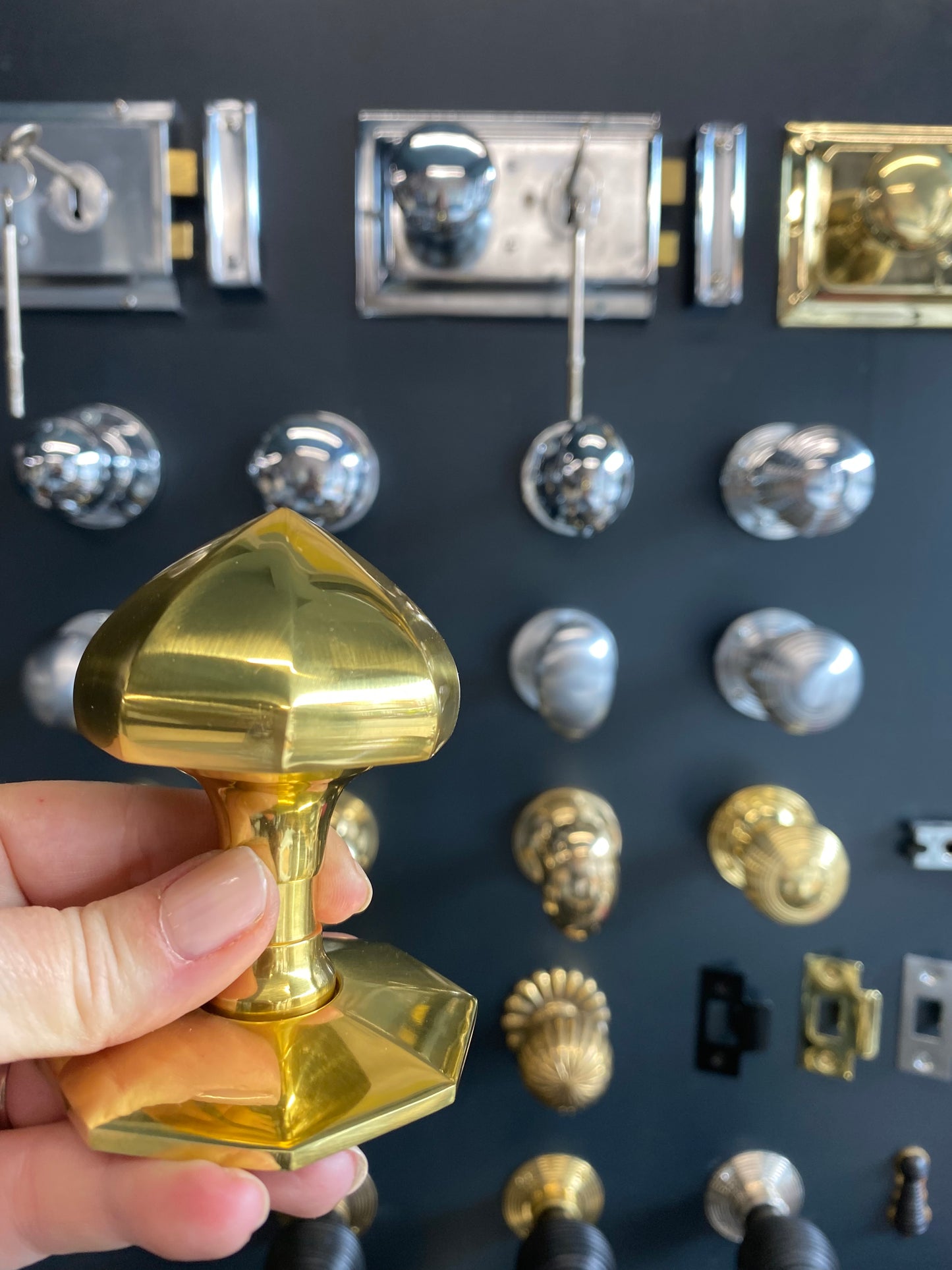 Faceted centre door knob polished brass