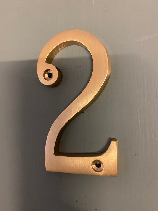 Satin brass numeral “2”