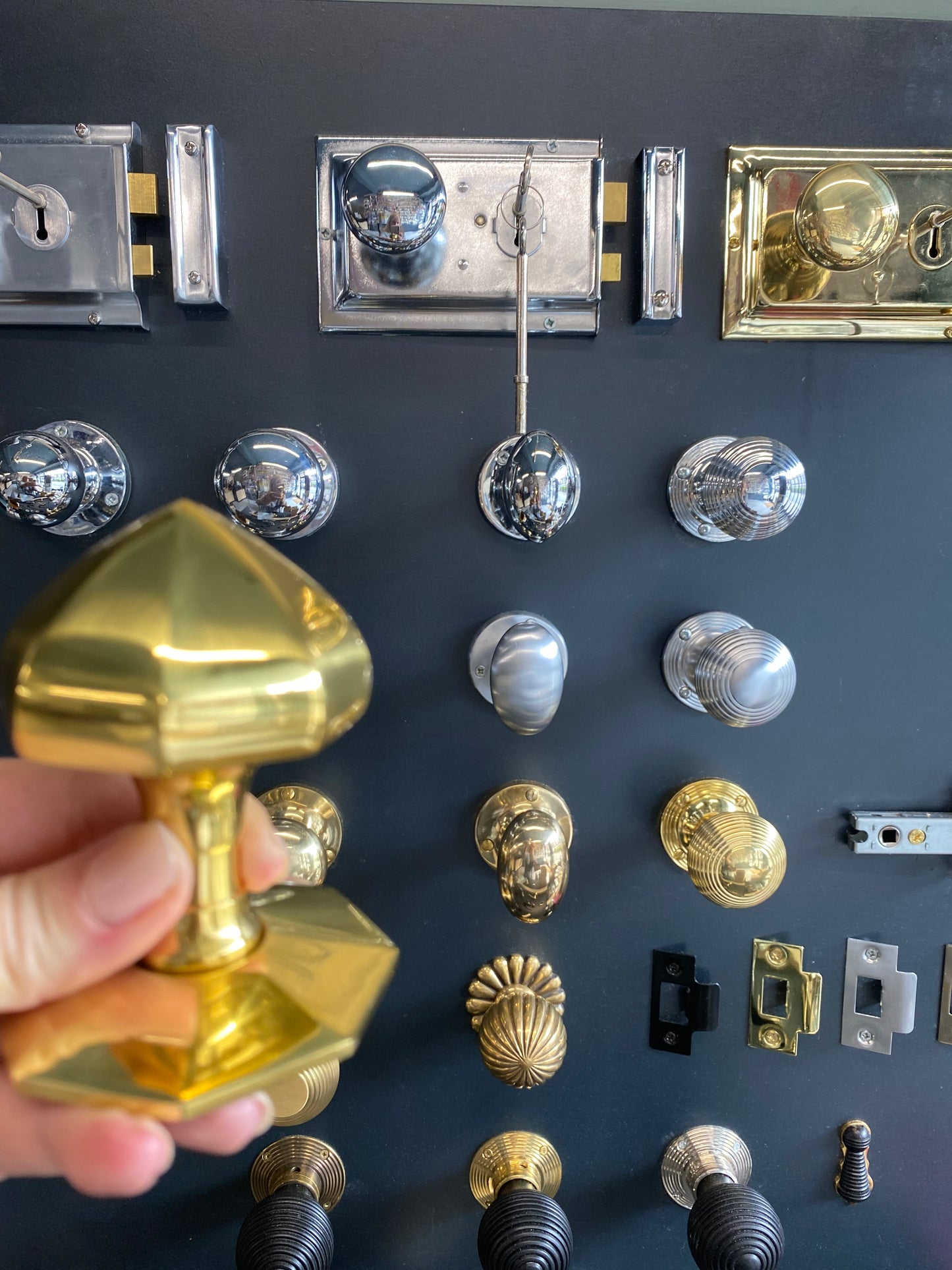 Faceted centre door knob polished brass