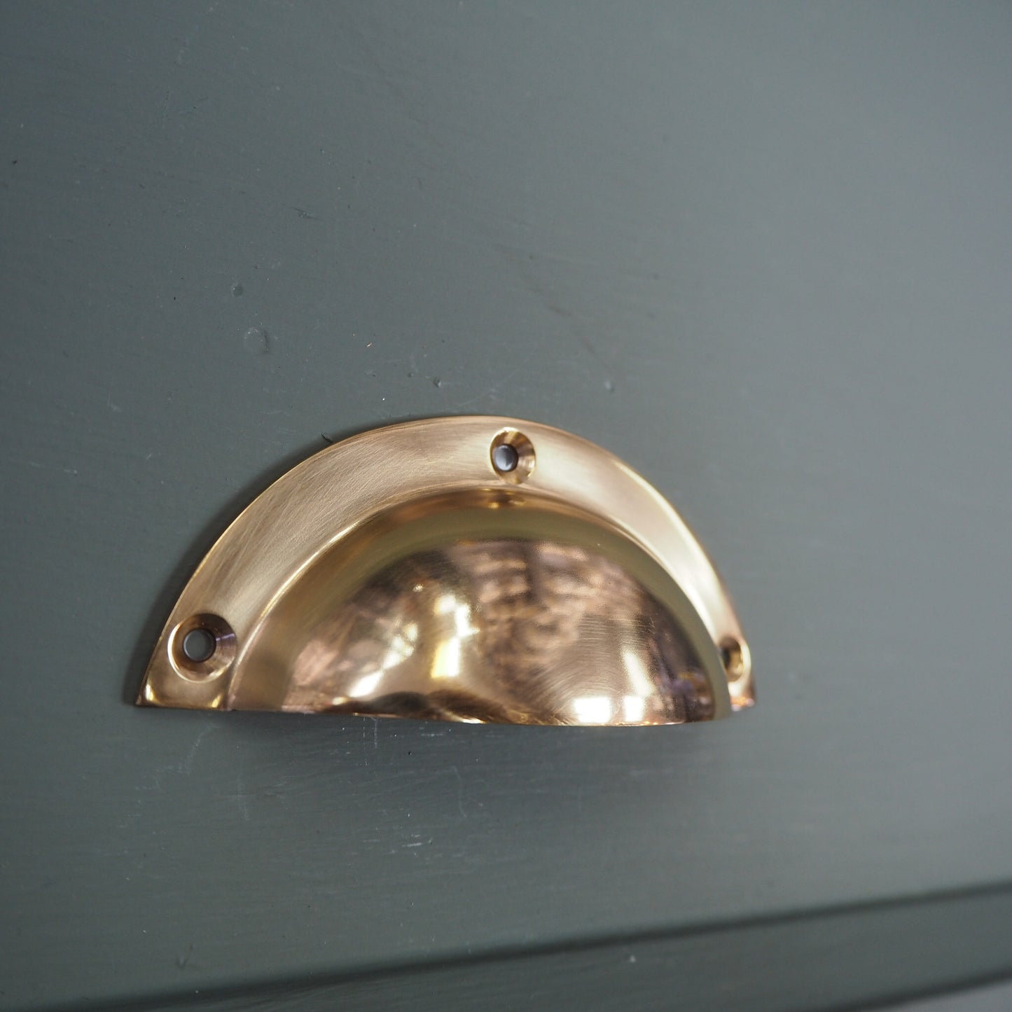 Polished brass drawer pull