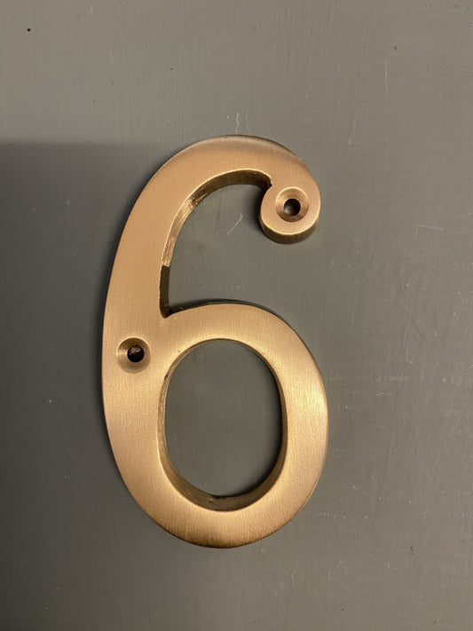 Satin brass numeral “6”