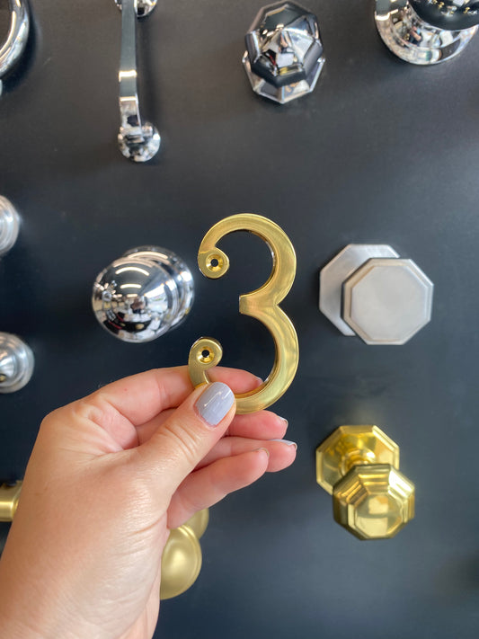 Polished brass numeral