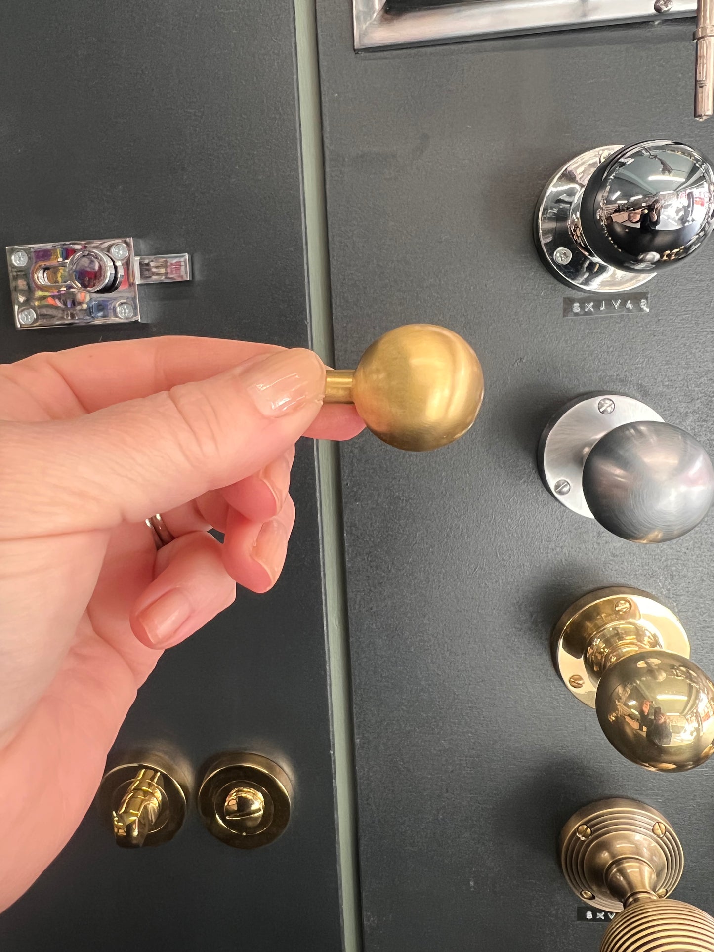 Sphere cabinet knob in satin brass