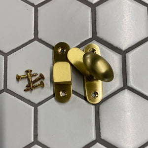 Cabinet hook and plate in satin brass
